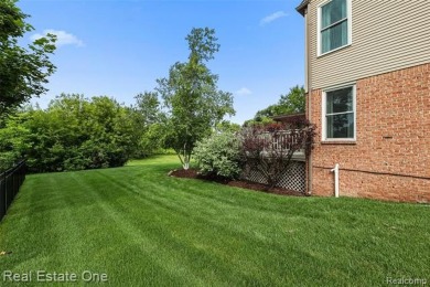 This treasured move-in ready 4-bedroom, 2.5 bathroom brick on Cracklewood Golf Club in Michigan - for sale on GolfHomes.com, golf home, golf lot