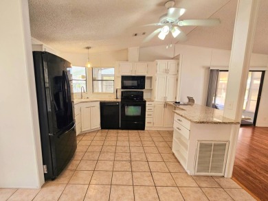 Located in a 55+ resort-style manufactured home community on on Big Cypress Golf and Country Club in Florida - for sale on GolfHomes.com, golf home, golf lot