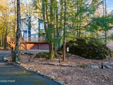CONTEMPORARY LOG-SIDED CHALET, JUST A MINUTE OR TWO WALK TO THE on The Hideout Golf in Pennsylvania - for sale on GolfHomes.com, golf home, golf lot