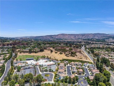 This well-maintained CORNER townhome sits in the sought-after on Tustin Ranch Golf Club in California - for sale on GolfHomes.com, golf home, golf lot