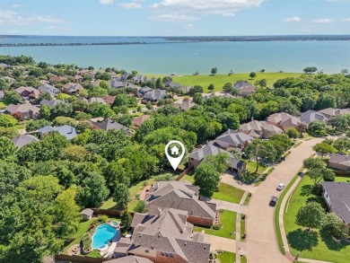 This BEAUTY is nestled on a spacious third-acre lot with a on The Shores Country Club in Texas - for sale on GolfHomes.com, golf home, golf lot