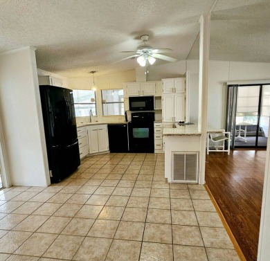 Located in a 55+ resort-style manufactured home community on on Big Cypress Golf and Country Club in Florida - for sale on GolfHomes.com, golf home, golf lot