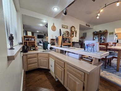 This stunning 2,665 sq ft home offers 3 bedrooms and 3 and a on Twin Lakes Golf Club in Arkansas - for sale on GolfHomes.com, golf home, golf lot