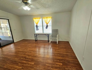 Located in a 55+ resort-style manufactured home community on on Big Cypress Golf and Country Club in Florida - for sale on GolfHomes.com, golf home, golf lot