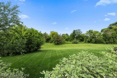 This treasured move-in ready 4-bedroom, 2.5 bathroom brick on Cracklewood Golf Club in Michigan - for sale on GolfHomes.com, golf home, golf lot
