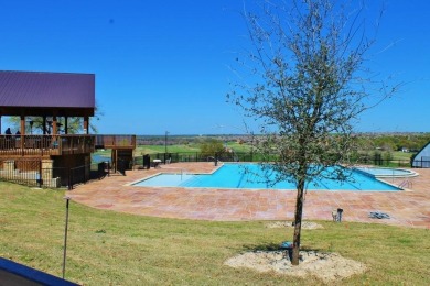 This BEAUTY is nestled on a spacious third-acre lot with a on The Shores Country Club in Texas - for sale on GolfHomes.com, golf home, golf lot