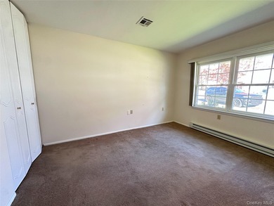 Welcome to this Baronet model that features two spacious on Leisure Village Golf Course in New York - for sale on GolfHomes.com, golf home, golf lot