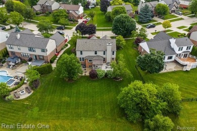 This treasured move-in ready 4-bedroom, 2.5 bathroom brick on Cracklewood Golf Club in Michigan - for sale on GolfHomes.com, golf home, golf lot