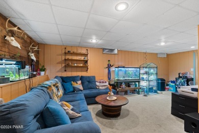 CONTEMPORARY LOG-SIDED CHALET, JUST A MINUTE OR TWO WALK TO THE on The Hideout Golf in Pennsylvania - for sale on GolfHomes.com, golf home, golf lot