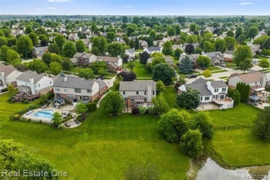 This treasured move-in ready 4-bedroom, 2.5 bathroom brick on Cracklewood Golf Club in Michigan - for sale on GolfHomes.com, golf home, golf lot