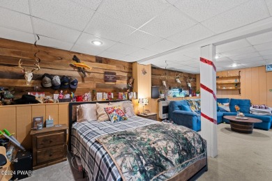CONTEMPORARY LOG-SIDED CHALET, JUST A MINUTE OR TWO WALK TO THE on The Hideout Golf in Pennsylvania - for sale on GolfHomes.com, golf home, golf lot