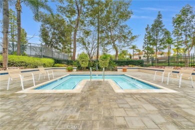 This well-maintained CORNER townhome sits in the sought-after on Tustin Ranch Golf Club in California - for sale on GolfHomes.com, golf home, golf lot