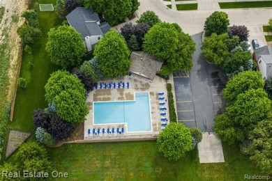 This treasured move-in ready 4-bedroom, 2.5 bathroom brick on Cracklewood Golf Club in Michigan - for sale on GolfHomes.com, golf home, golf lot