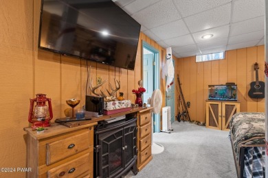 CONTEMPORARY LOG-SIDED CHALET, JUST A MINUTE OR TWO WALK TO THE on The Hideout Golf in Pennsylvania - for sale on GolfHomes.com, golf home, golf lot