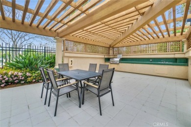 This well-maintained CORNER townhome sits in the sought-after on Tustin Ranch Golf Club in California - for sale on GolfHomes.com, golf home, golf lot