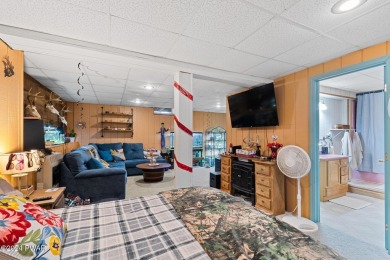 CONTEMPORARY LOG-SIDED CHALET, JUST A MINUTE OR TWO WALK TO THE on The Hideout Golf in Pennsylvania - for sale on GolfHomes.com, golf home, golf lot