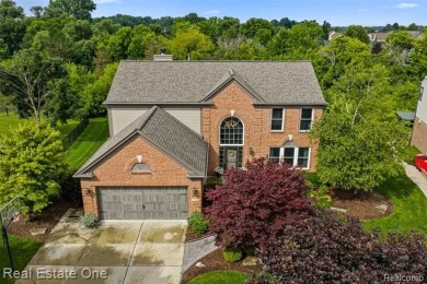 This treasured move-in ready 4-bedroom, 2.5 bathroom brick on Cracklewood Golf Club in Michigan - for sale on GolfHomes.com, golf home, golf lot