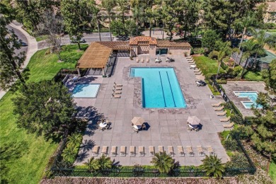 This well-maintained CORNER townhome sits in the sought-after on Tustin Ranch Golf Club in California - for sale on GolfHomes.com, golf home, golf lot