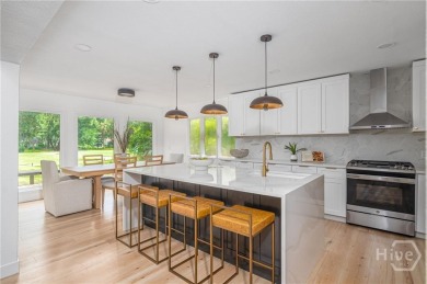 Flooded with natural light, this stunning Scandinavian-inspired on The Landings Club - Plantation in Georgia - for sale on GolfHomes.com, golf home, golf lot