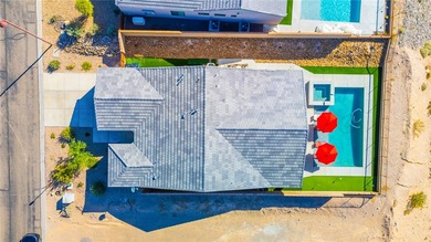 Experience modern resort living in this newer 2024 home, located on Laughlin Ranch Golf Club in Arizona - for sale on GolfHomes.com, golf home, golf lot