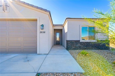 Experience modern resort living in this newer 2024 home, located on Laughlin Ranch Golf Club in Arizona - for sale on GolfHomes.com, golf home, golf lot