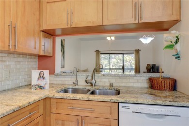 MOTIVATED SELLER....E HOME TO PELICAN POINTE.... One of on Pelican Pointe 9 Hole Course in Florida - for sale on GolfHomes.com, golf home, golf lot