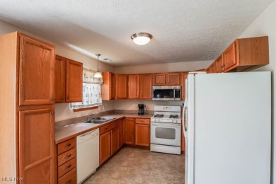 Enjoy beautiful golf course views from this free-standing condo on Ohio Prestwick Country Club in Ohio - for sale on GolfHomes.com, golf home, golf lot