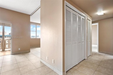 Enjoy breathtaking, Hollywood skyline views from this penthouse on Hillcrest Golf and Country Club in Florida - for sale on GolfHomes.com, golf home, golf lot