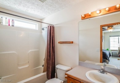 Enjoy beautiful golf course views from this free-standing condo on Ohio Prestwick Country Club in Ohio - for sale on GolfHomes.com, golf home, golf lot