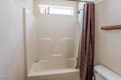 Enjoy beautiful golf course views from this free-standing condo on Ohio Prestwick Country Club in Ohio - for sale on GolfHomes.com, golf home, golf lot