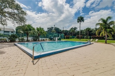 MOTIVATED SELLER....E HOME TO PELICAN POINTE.... One of on Pelican Pointe 9 Hole Course in Florida - for sale on GolfHomes.com, golf home, golf lot