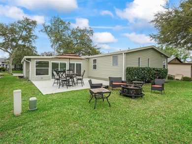 Turn-key, No Bond, Water and Golf View and an incredible home on Orange Blossom Hills Golf and Country Club in Florida - for sale on GolfHomes.com, golf home, golf lot