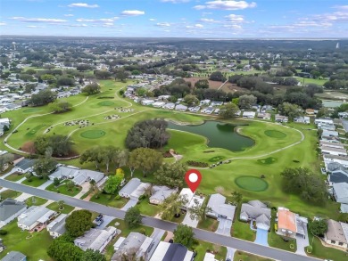 Turn-key, No Bond, Water and Golf View and an incredible home on Orange Blossom Hills Golf and Country Club in Florida - for sale on GolfHomes.com, golf home, golf lot