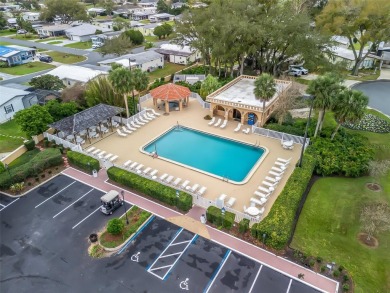 Turn-key, No Bond, Water and Golf View and an incredible home on Orange Blossom Hills Golf and Country Club in Florida - for sale on GolfHomes.com, golf home, golf lot