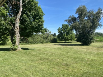 Country setting, All brick 1.5 story home located on 5 acres. (2 on Angels Crossing Golf Club in Michigan - for sale on GolfHomes.com, golf home, golf lot