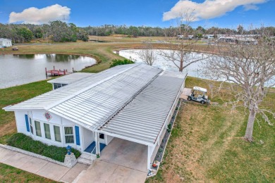 Amazing & Well-Maintained Palm Harbor Home - Premium Waterfront on Plantation Golf Club in Florida - for sale on GolfHomes.com, golf home, golf lot