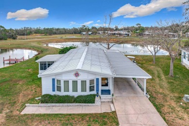 Amazing & Well-Maintained Palm Harbor Home - Premium Waterfront on Plantation Golf Club in Florida - for sale on GolfHomes.com, golf home, golf lot