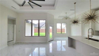 Step into this exquisite home, 
The open living room seamlessly on Los Lagos Golf Club in Texas - for sale on GolfHomes.com, golf home, golf lot