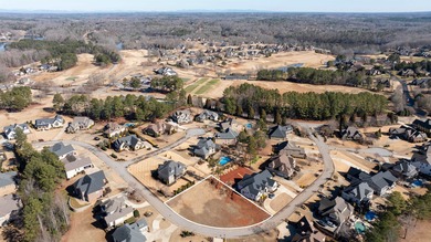 Build your dream home on this spacious .40-acre lot nestled in a on Woodfin Ridge Golf Club in South Carolina - for sale on GolfHomes.com, golf home, golf lot
