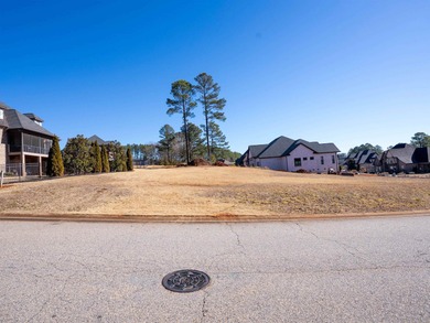 Build your dream home on this spacious .40-acre lot nestled in a on Woodfin Ridge Golf Club in South Carolina - for sale on GolfHomes.com, golf home, golf lot