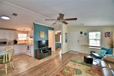 WELCOME TO YOUR FLORIDA RETIREMENT OASIS IN A GATED 55+COMMUNITY on Southern Dunes Golf and Country Club in Florida - for sale on GolfHomes.com, golf home, golf lot