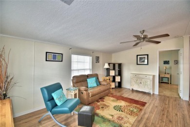 WELCOME TO YOUR FLORIDA RETIREMENT OASIS IN A GATED 55+COMMUNITY on Southern Dunes Golf and Country Club in Florida - for sale on GolfHomes.com, golf home, golf lot