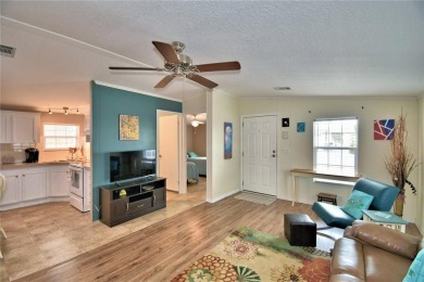 WELCOME TO YOUR FLORIDA RETIREMENT OASIS IN A GATED 55+COMMUNITY on Southern Dunes Golf and Country Club in Florida - for sale on GolfHomes.com, golf home, golf lot