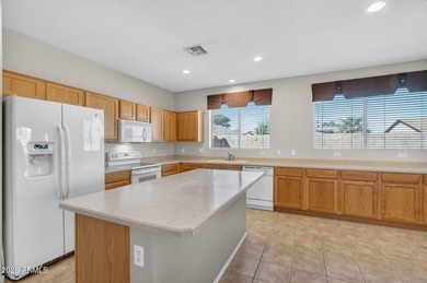 This PREMIUM CORNER LOT on a cul-de-sac street is directly on The Golf Club At Johnson Ranch in Arizona - for sale on GolfHomes.com, golf home, golf lot