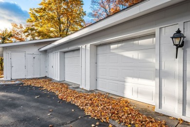 This first-floor unit offers a large living room with vaulted on Bay Ridge Golf Course in Wisconsin - for sale on GolfHomes.com, golf home, golf lot