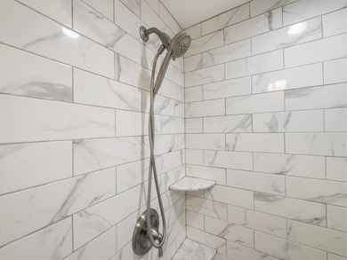 Fully renovated and move-in ready, this upgraded home offers on Barefoot Bay Golf Course in Florida - for sale on GolfHomes.com, golf home, golf lot