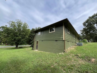 Discover the perfect blend of comfort and convenience with this on The Course At Turkey Mountain in Arkansas - for sale on GolfHomes.com, golf home, golf lot