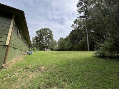 Discover the perfect blend of comfort and convenience with this on The Course At Turkey Mountain in Arkansas - for sale on GolfHomes.com, golf home, golf lot