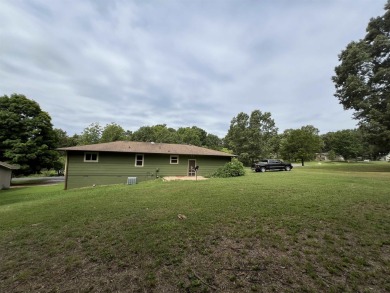 Discover the perfect blend of comfort and convenience with this on The Course At Turkey Mountain in Arkansas - for sale on GolfHomes.com, golf home, golf lot