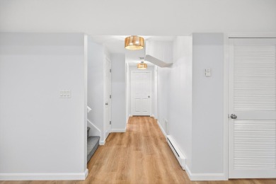 Prepare to be wowed! This fully renovated in 2023, end-unit on The Club At Yarmouthport in Massachusetts - for sale on GolfHomes.com, golf home, golf lot